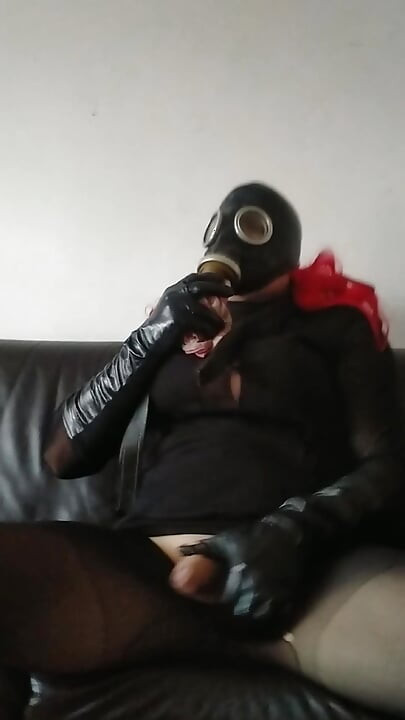 Gas Mask Pp Leather Belt Around the Neck and a Big Load