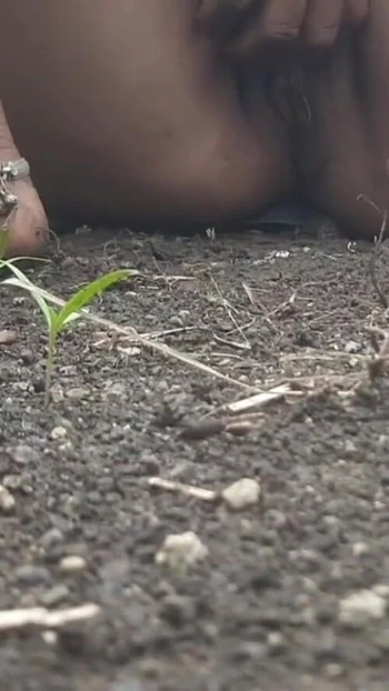 Powerful moment from "In the outdoor open field, my sister-in-law is urinating with fingers in her pussy, showing her"
