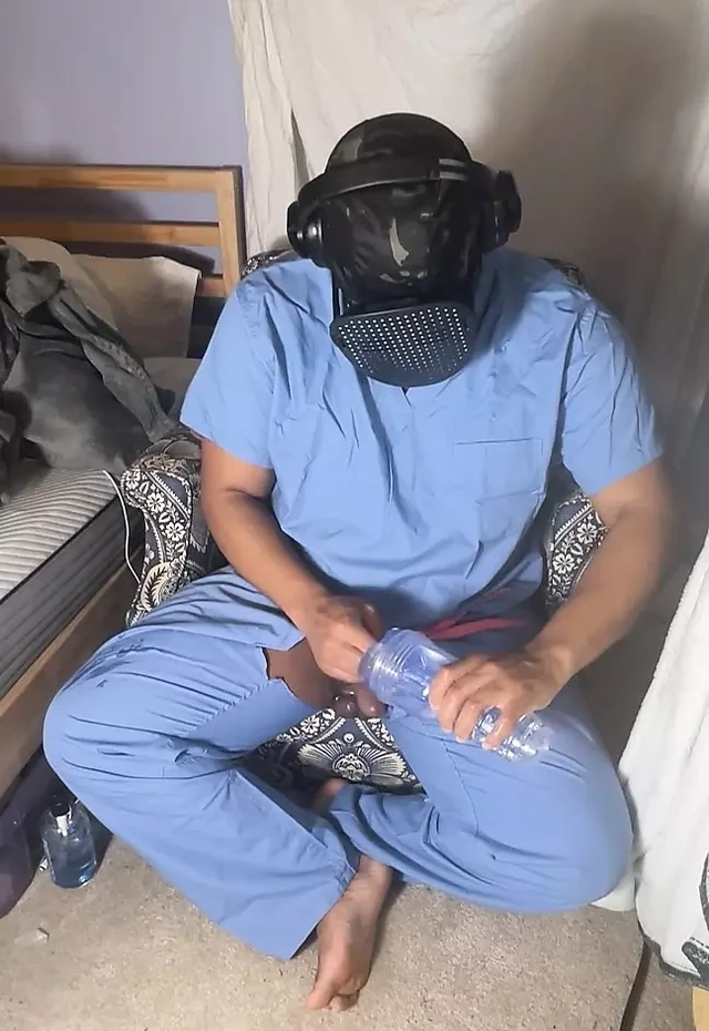 Man In Scrubs Jerking Out A Moaning Cumshot With Fleshlight