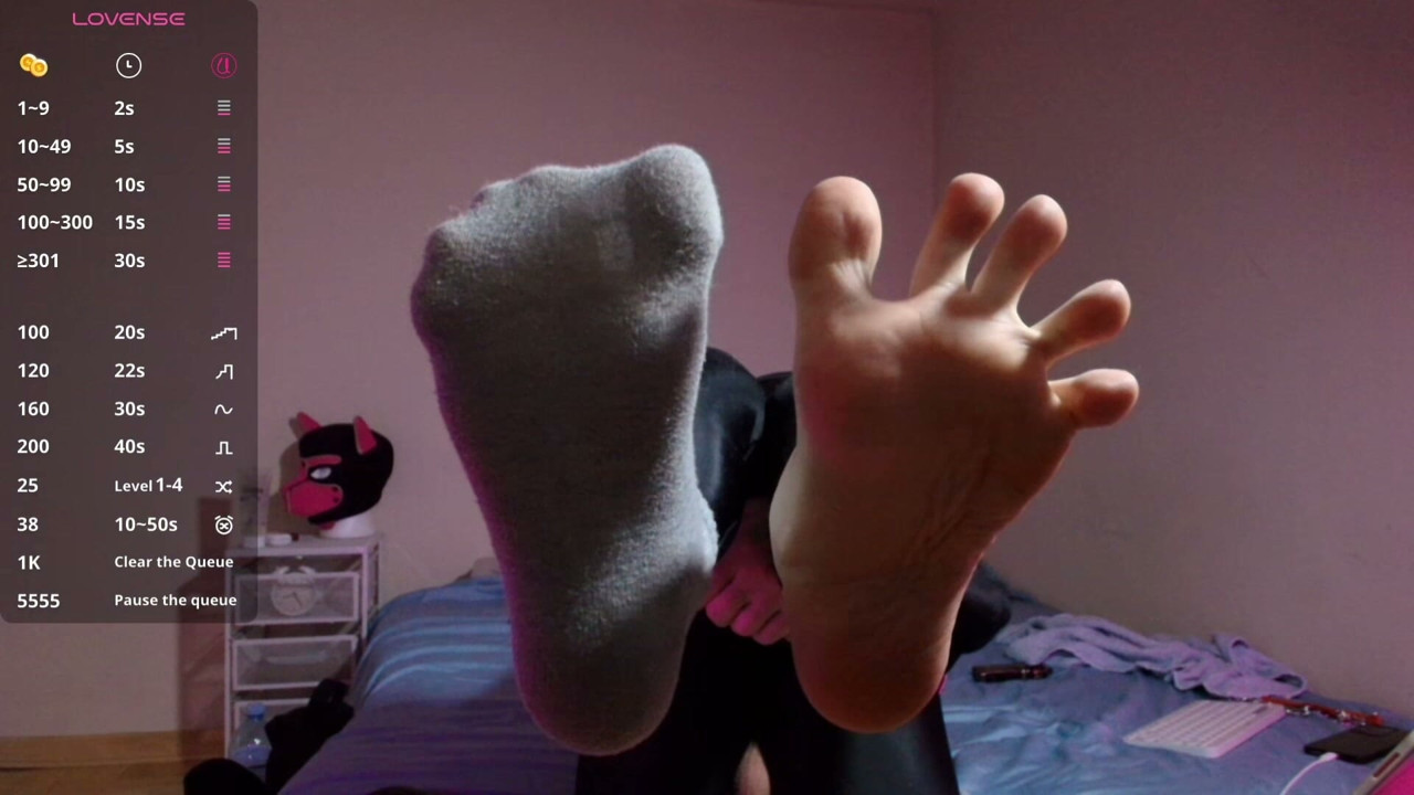 Puppy keeps teasing you with his socks and bare paws