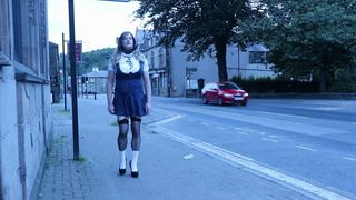 crossdressed in uniform outdoors on a main road