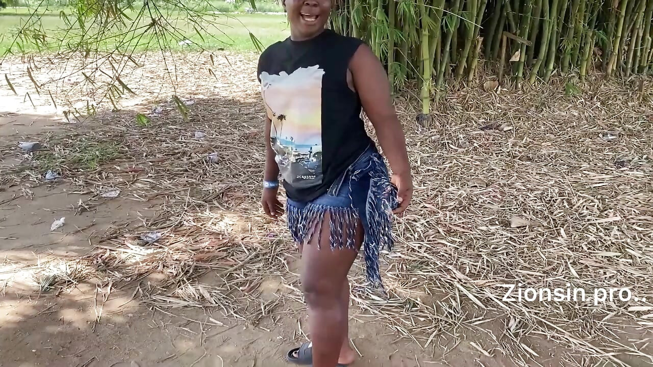 Ebony sexy black girl dances in outdoor with much laughter