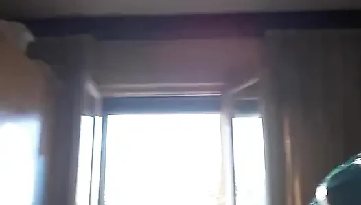 In Front of the Window with the Window Open