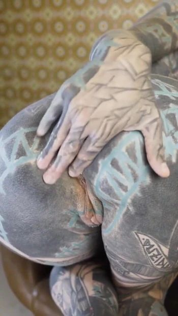 Unforgettable moment from "Tattooed woman trying out a machine for anal play"
