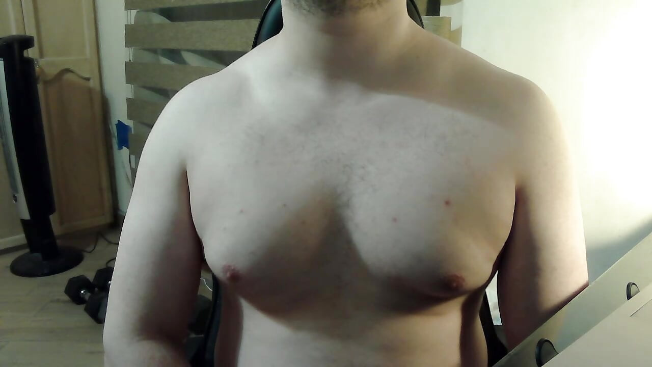 Flexing and bouncing pecs on cam