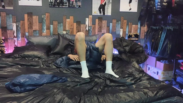 Cock Rubbing Down Jacket on Shiny Nylon Bed