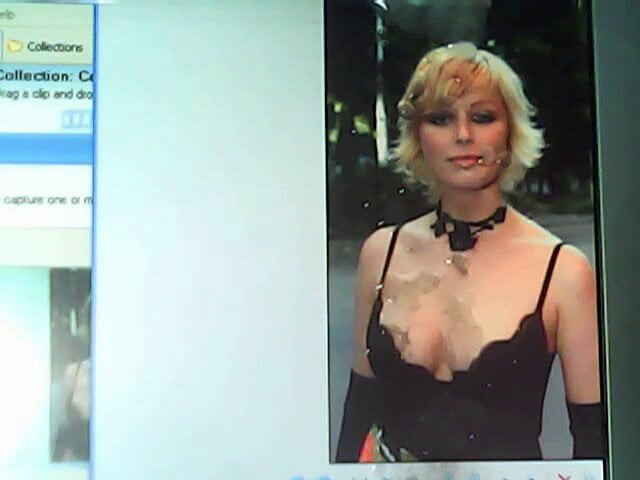 Cum tributing a sexy blonde in a black top