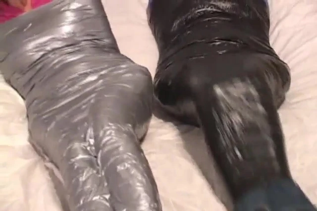 Tape mummified girls gagtalk and fight