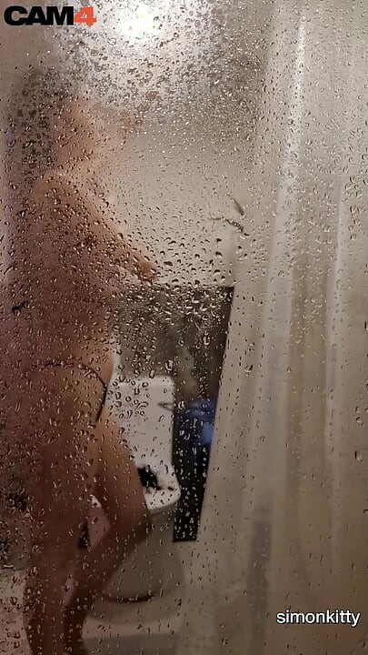 Check out this steamy shower scene with hot naked Simon