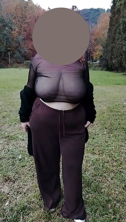 My stepmother walking in a transparent T-shirt.