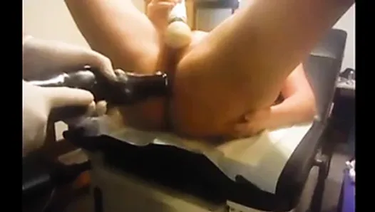 Anal torture in gyno chair