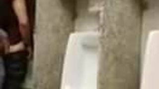 Cruising for sex and breeding a slut at a urinal while being