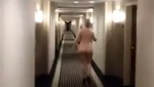 Walking naked in the hotel hallway