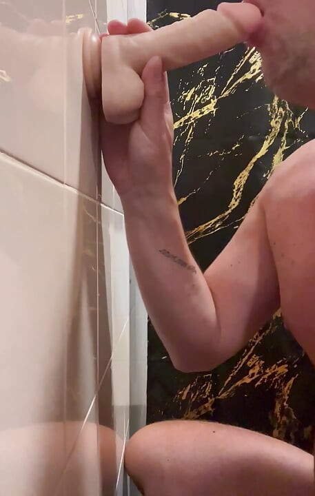 Sucking a Big DILDO Cock in the Bathroom