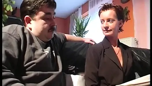 Sexy German slut in stockings takes care of two cocks
