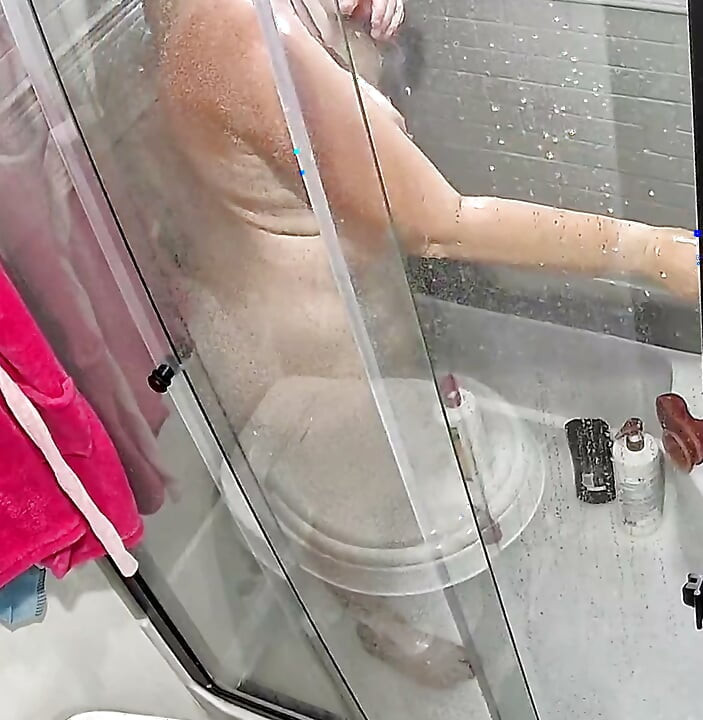 I was hot, wet, and horny in the shower and just had to fuck both my holes.