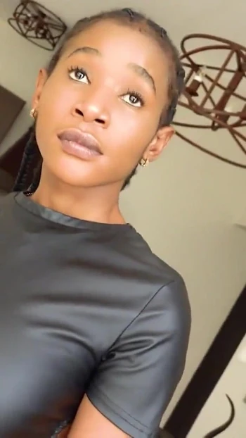 Emotional moment from "Shy Busty African Hottie Gets A Taste Of The Real American Dream"