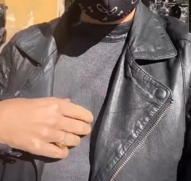 Walking with my leather outfit in streets