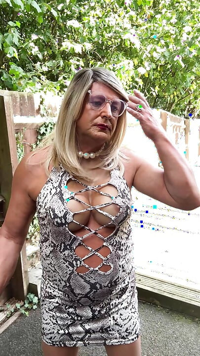 Sexy Crossdresser kellycd2022 in white animal print dress pantyhose and heels