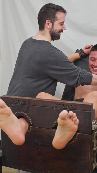 PSMTickling - College Jock Arley Faces Ultimate Test Ticklish Feet Locked in Stocks | Clip 1