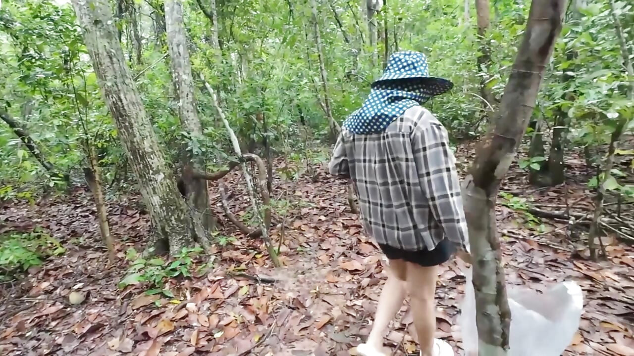 Thai girls walking and talking and picking mushrooms in the forest, secretly showing in the deep forest Clear Thai voice
