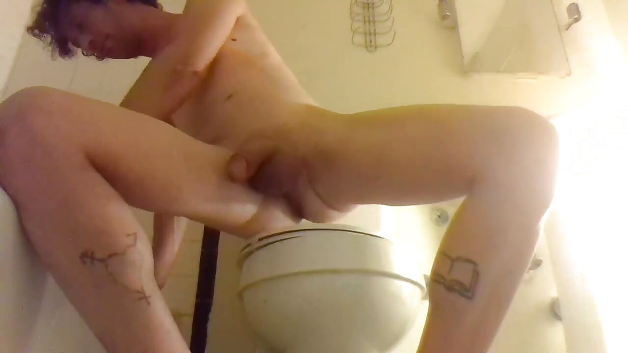 Stroking While Smoking, on a Toilet