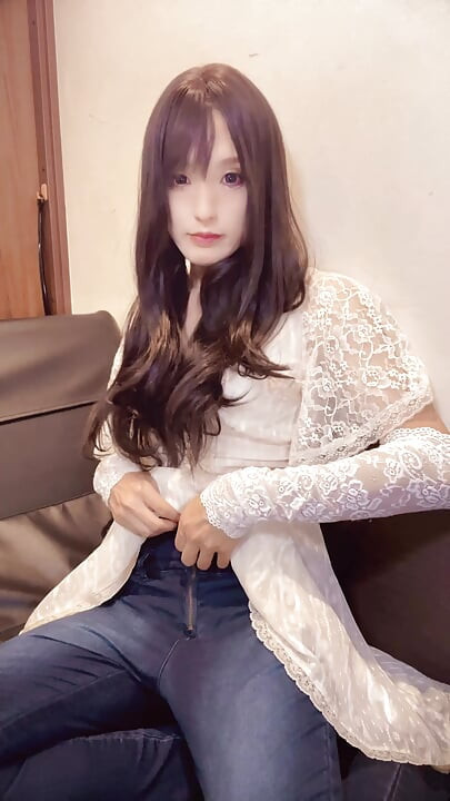A video of a soft, soft-haired crossdresser quietly masturbating.