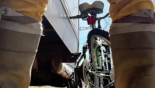 pee on the ground near truck wheel