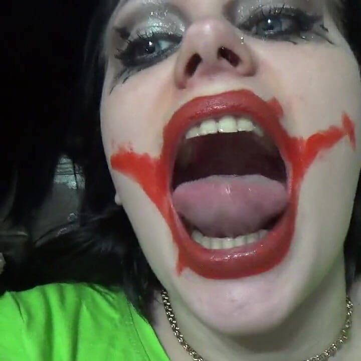Two crazy clown girls dangle you above their hungry mouths before fighting over who will eat you alive