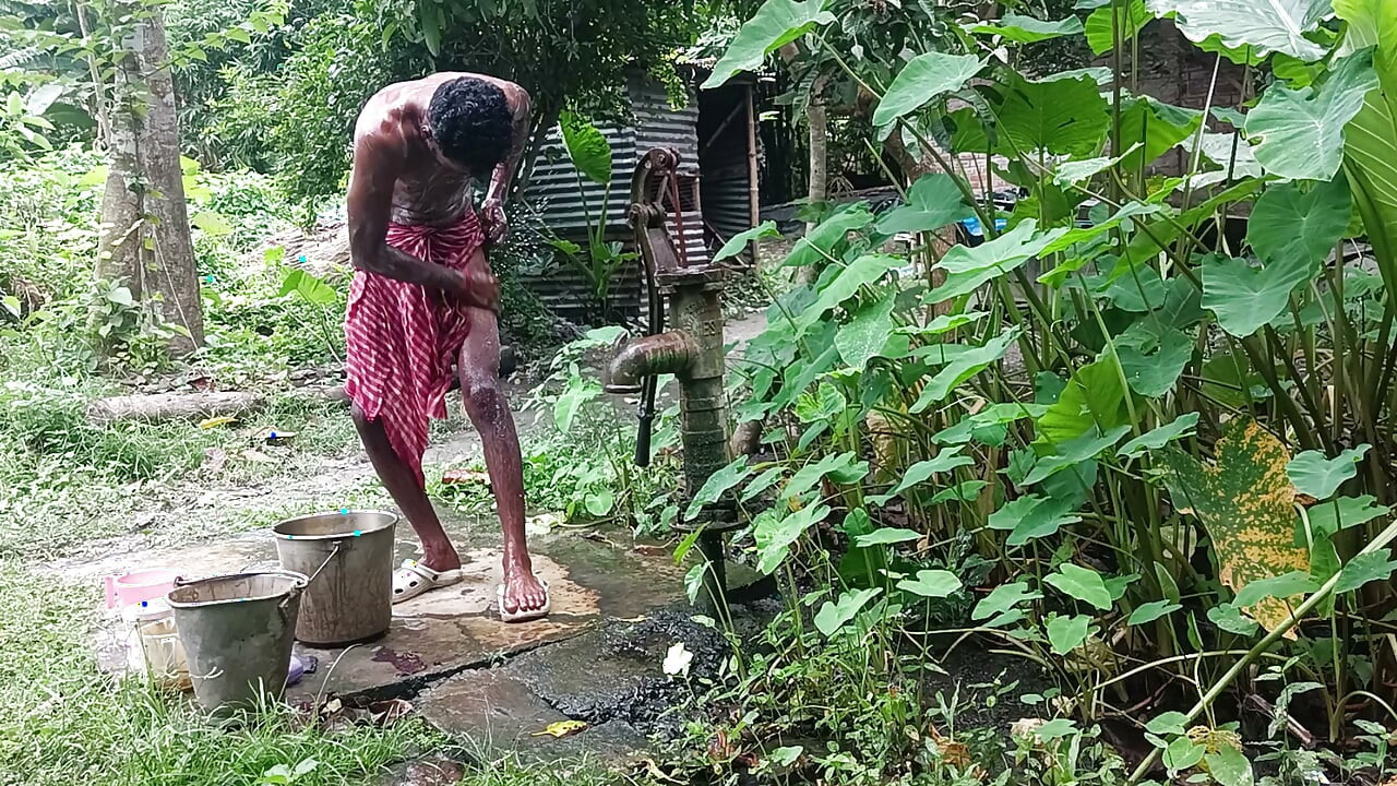 Tha naked Indian mature man shower in open place and showing body and dick..