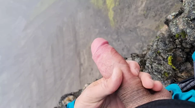 Cliffwanker - Felixproducer wanks on a rock and shoots his sticky load of sperm down that cliff