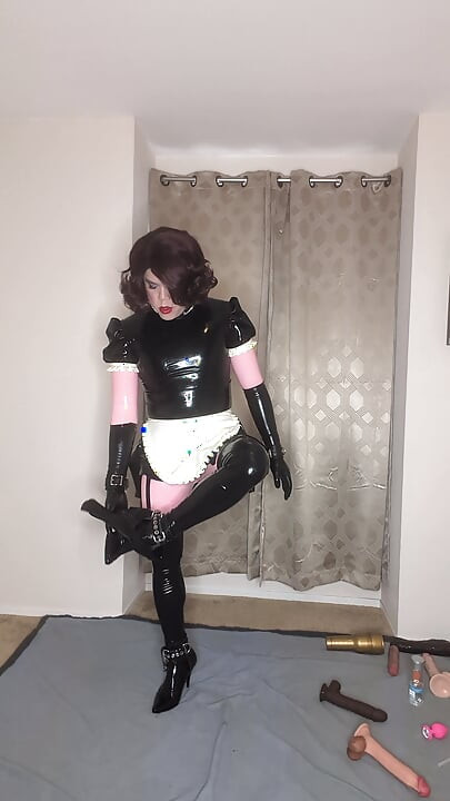 Latex Catsuit and Maid Dress Sissy Tries to Fuck Both of Her Holes with Dildos