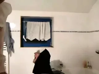 Old man having a nun fantasy at a hotel