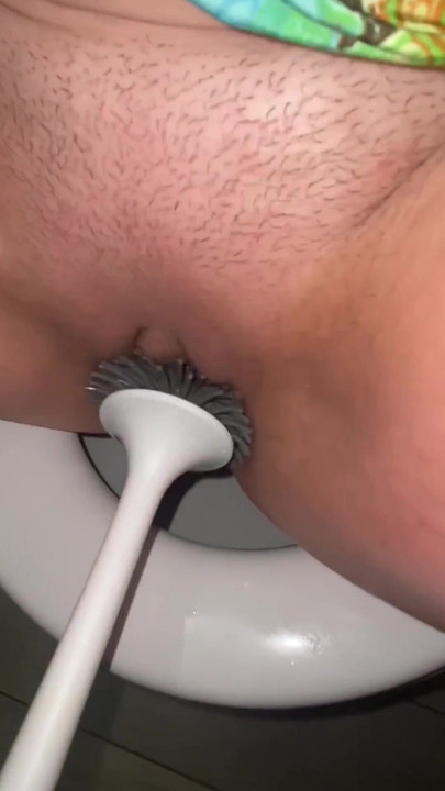 Captivating moment from "Licking public toilets in the hotel and playing with toilet brush"