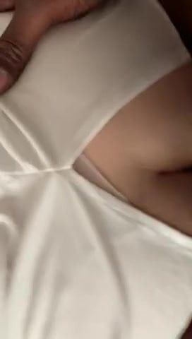From behind