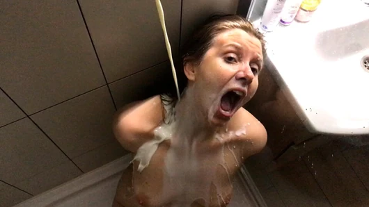 A sexy, long-haired, tied-up MILF gets doused with milk in the shower and gets fucked in the mouth - Lovessie