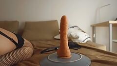 Big butt blondie shaking her ass and riding dildo on a plexi chair