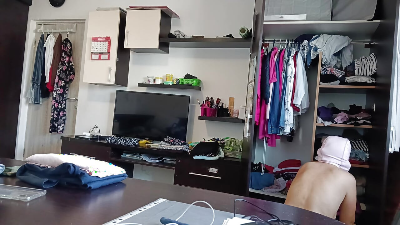 Amateur Woman Has Fun Trying on Clothes and Cutting Them.