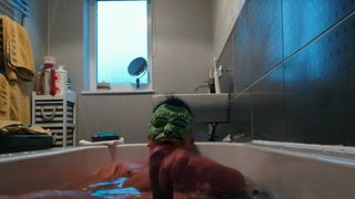 Bath wank with mask on