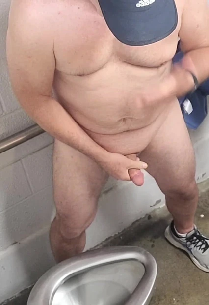 Swallowing my own cum in public men's room