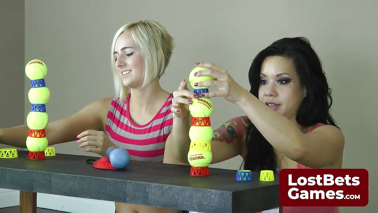 Kate and Kimmy dive into a playful game of Strip Ballstaks