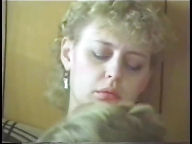 Cock-loving slut gives head while riding guy on the couch