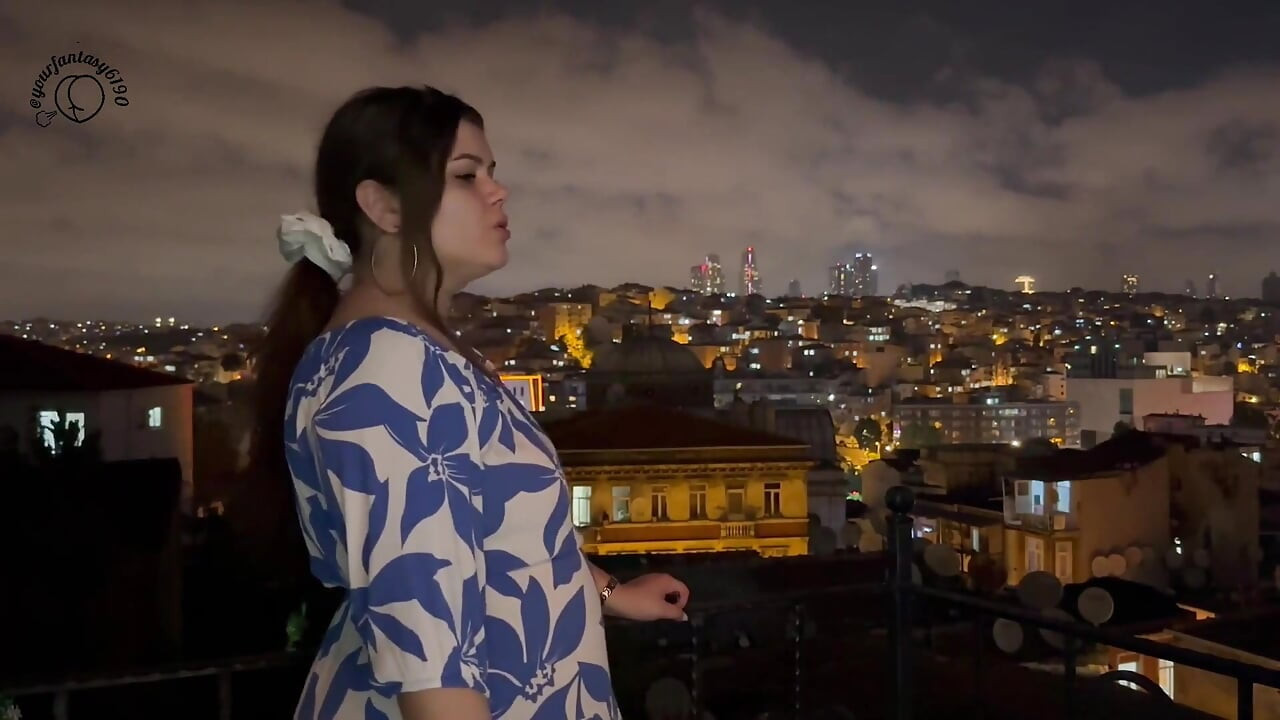 Smoking on the Balcony with a City View