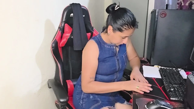 Beautiful stepmother with a tight pussy masturbates in her gaming chair