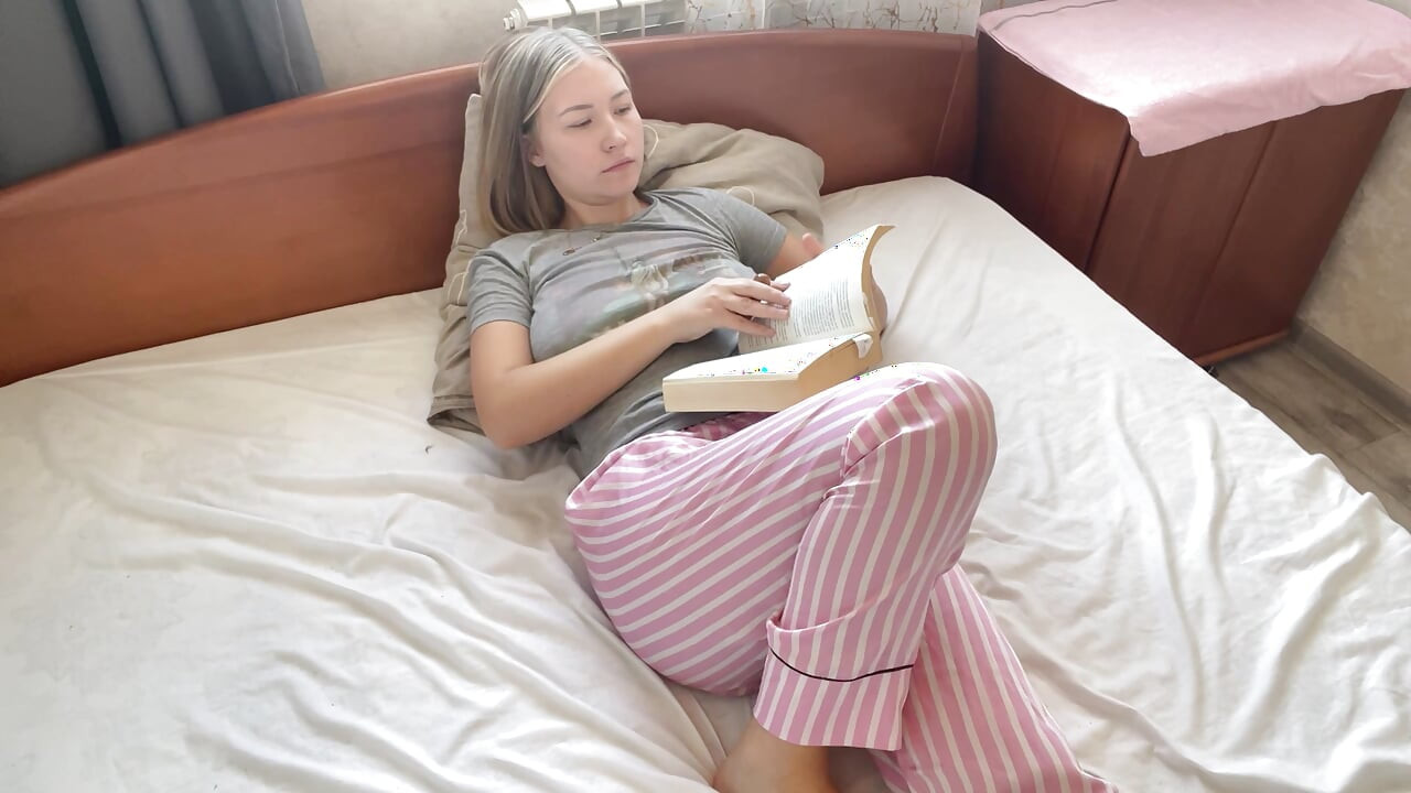 The blonde got aroused after reading an erotic book and received a real orgasm.