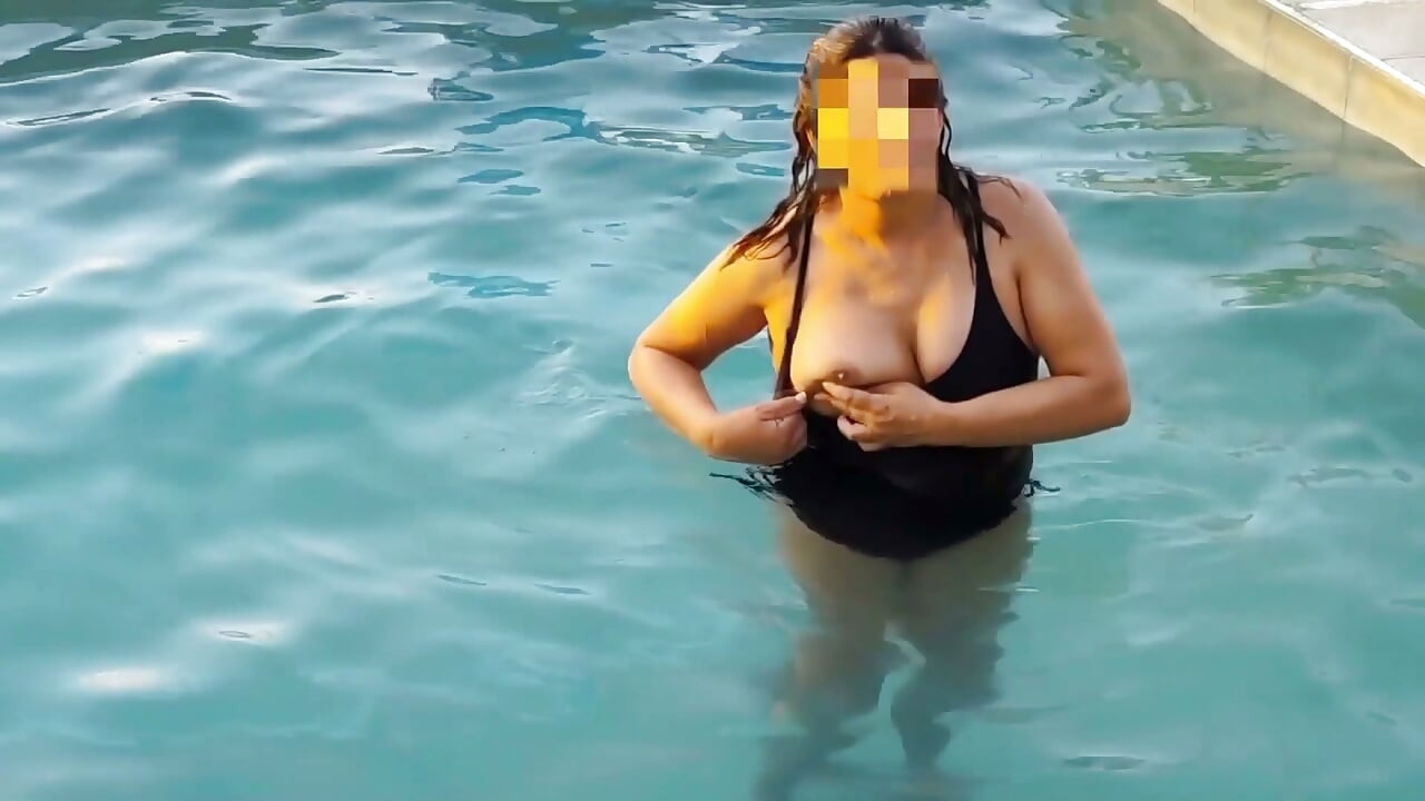 On the beach, my beautiful stepmother shows off her tits in public, and I jerk off when she shows me her hairy pussy.