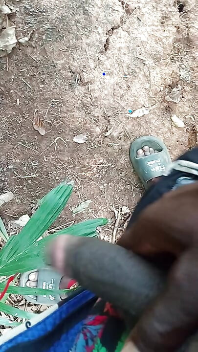 An Africans guy trying to wake his big dick