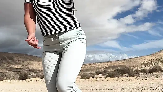 Girl can't hold pee and wet her pants on the public road