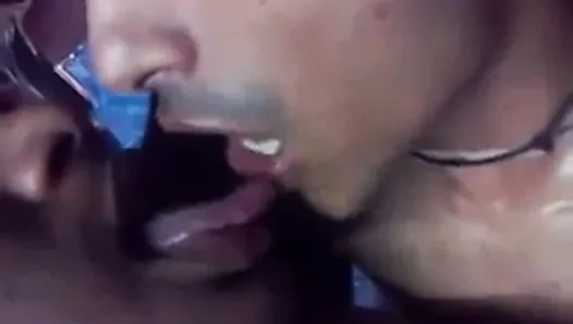 Two gay indians kissing