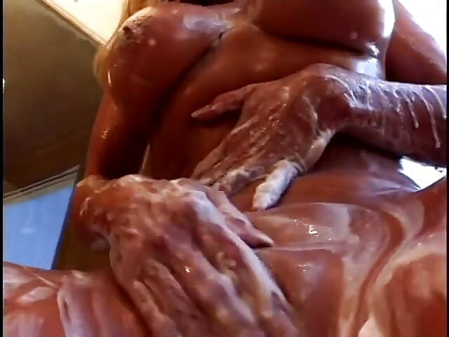 Blonde MILF with bouncy breasts sucks dick in the bathtub before fucking in bed